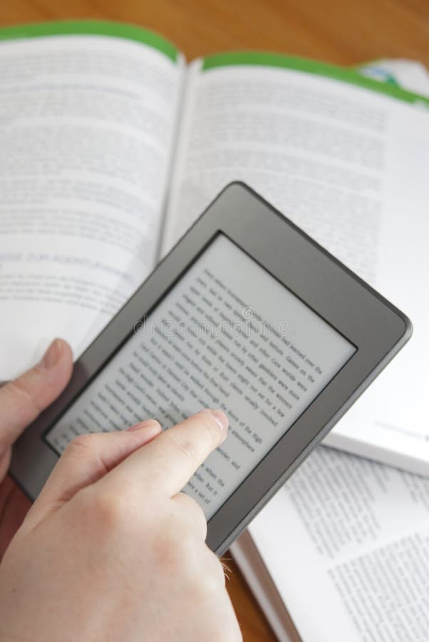 man-hands-holding-electronic-book-reader-text-screen-open-books-background-30281411